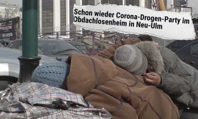 Dick eingepackter Obdachloser schläft auf der Straße